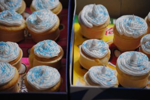 I placed the cones around the box, close enough that they gave each other support, but not rubbing frosting...well, at least I tried.